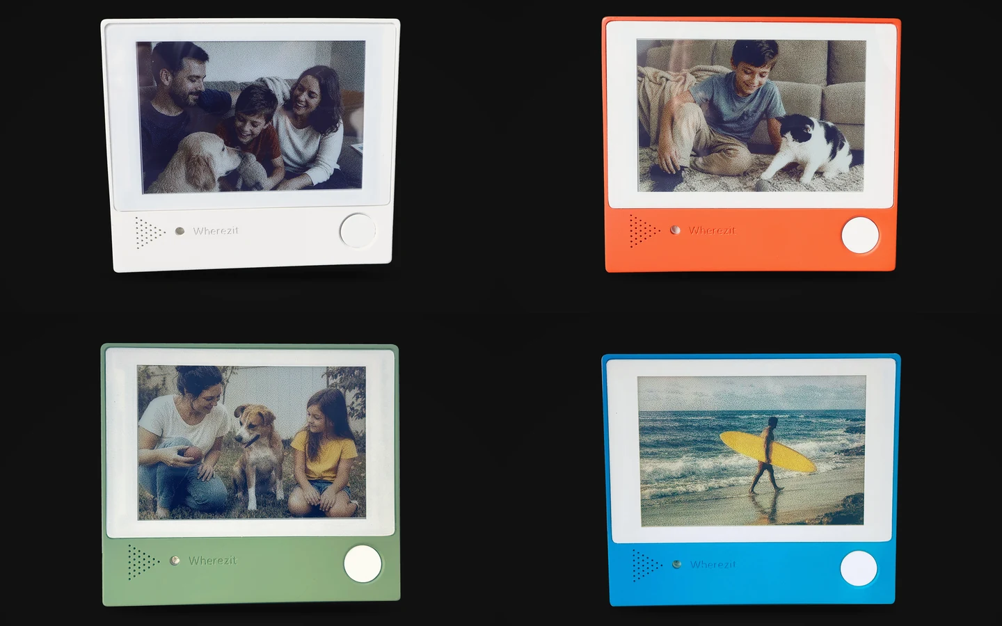 Four Wherezit e-paper photo frames in white, orange, green and blue, production units lined up on a black background, each showing an example photo.